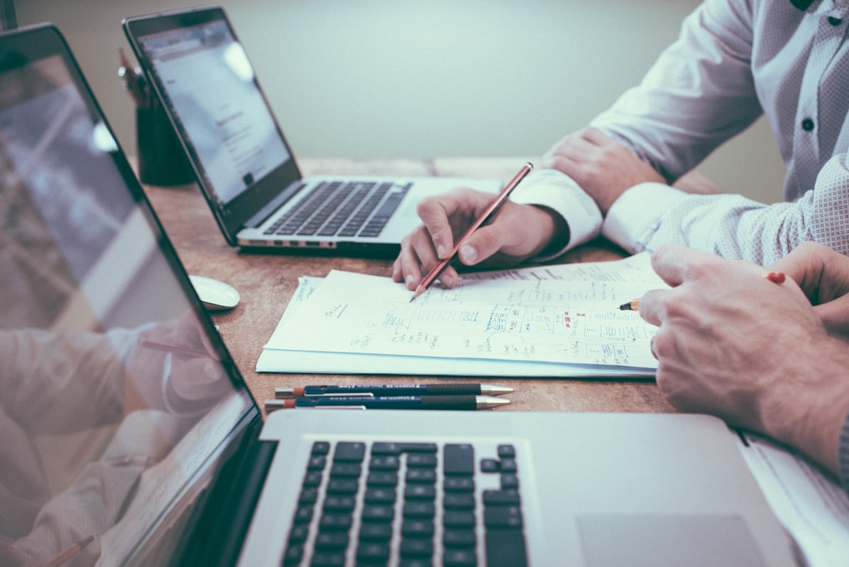 Compliance professionals reviewing transport documentation